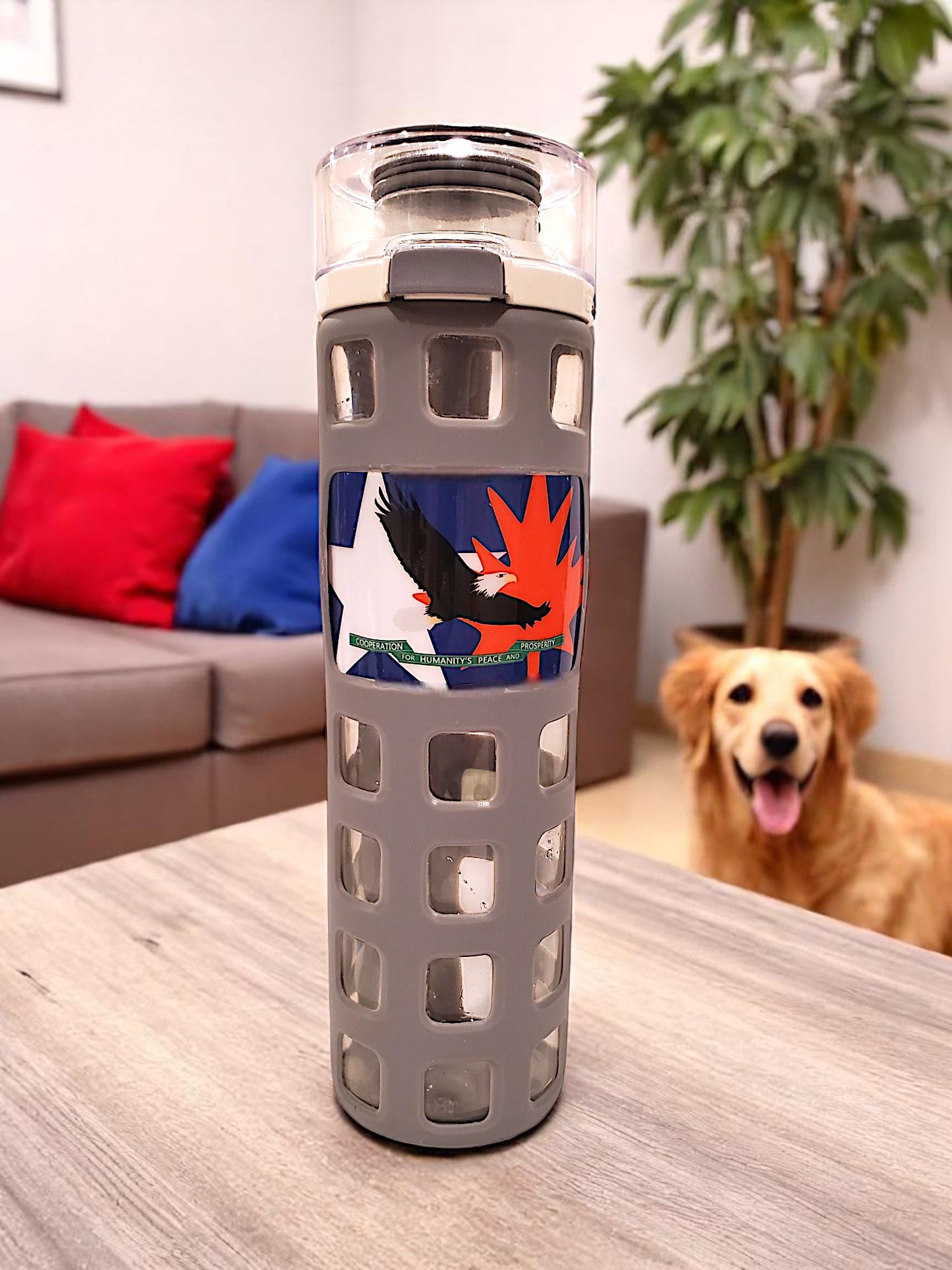 a Grey Glass water bottle with White Face Eagle